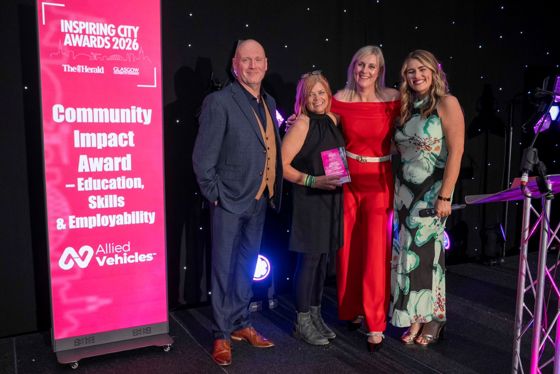 Representatives receiving the Community Impact Award for Education, Skills and Employability at the Inspiring City Awards 2026.