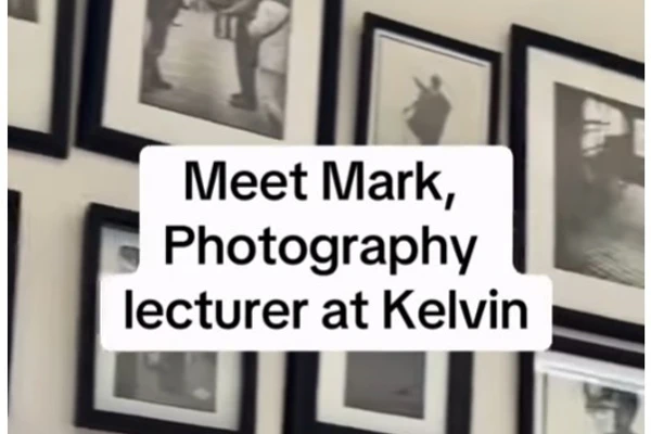 Framed black and white photographs on a gallery wall with text introducing Mark, a photography lecturer at Kelvin. Framed black and white photographs on a gallery wall with text introducing Mark, a photography lecturer at Kelvin.