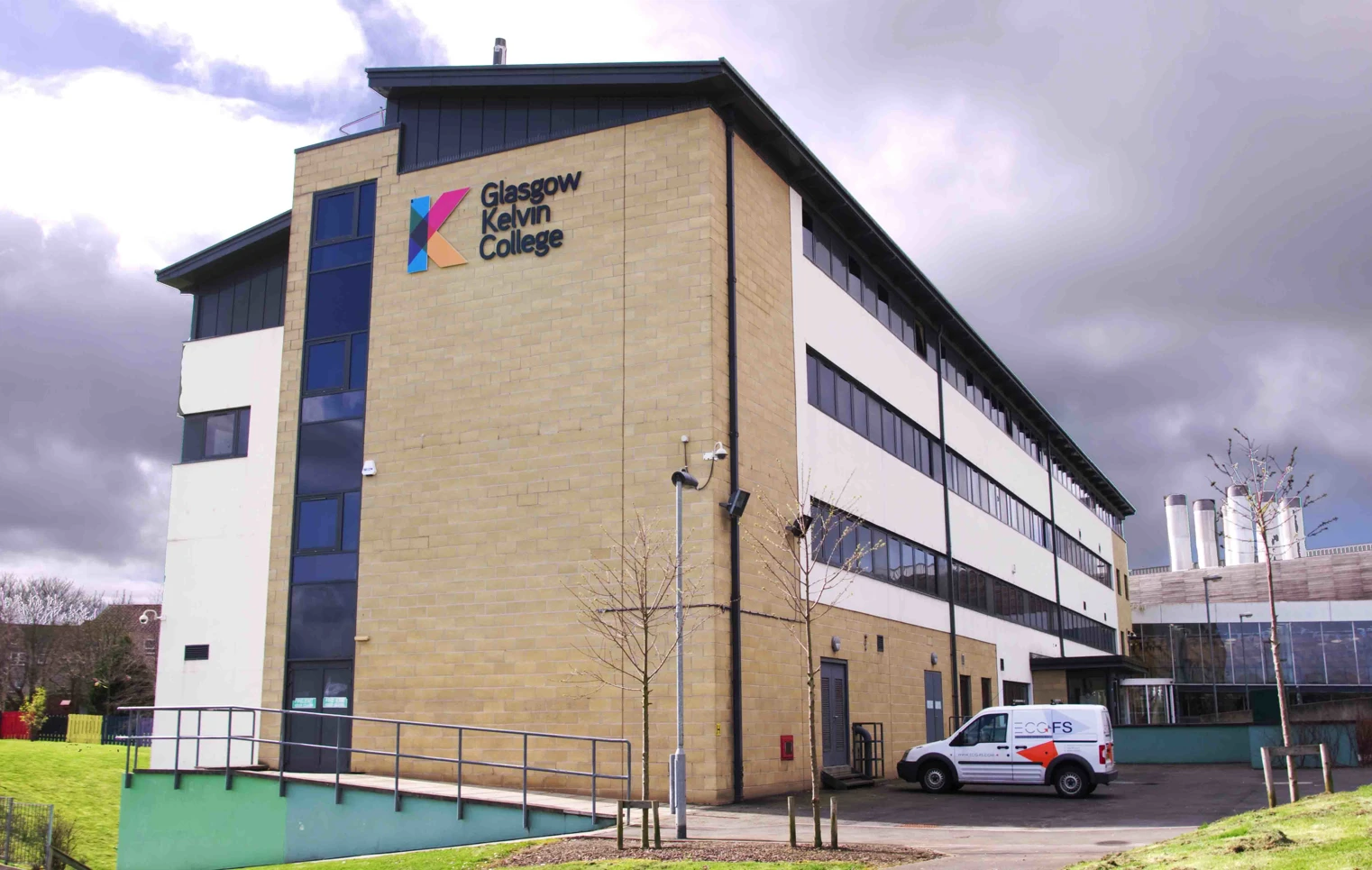 Exterior view of Glasgow Kelvin College Easterhouse Campus, showing the modern building and surrounding landscape. Exterior view of Glasgow Kelvin College Easterhouse Campus, showing the modern building and surrounding landscape.