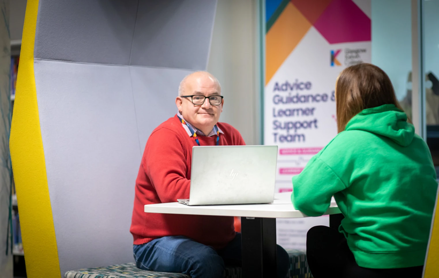 Advice and Guidance team member meeting with a student in a study pod at Glasgow Kelvin College’s Springburn campus. Advice and Guidance team member meeting with a student in a study pod at Glasgow Kelvin College’s Springburn campus.