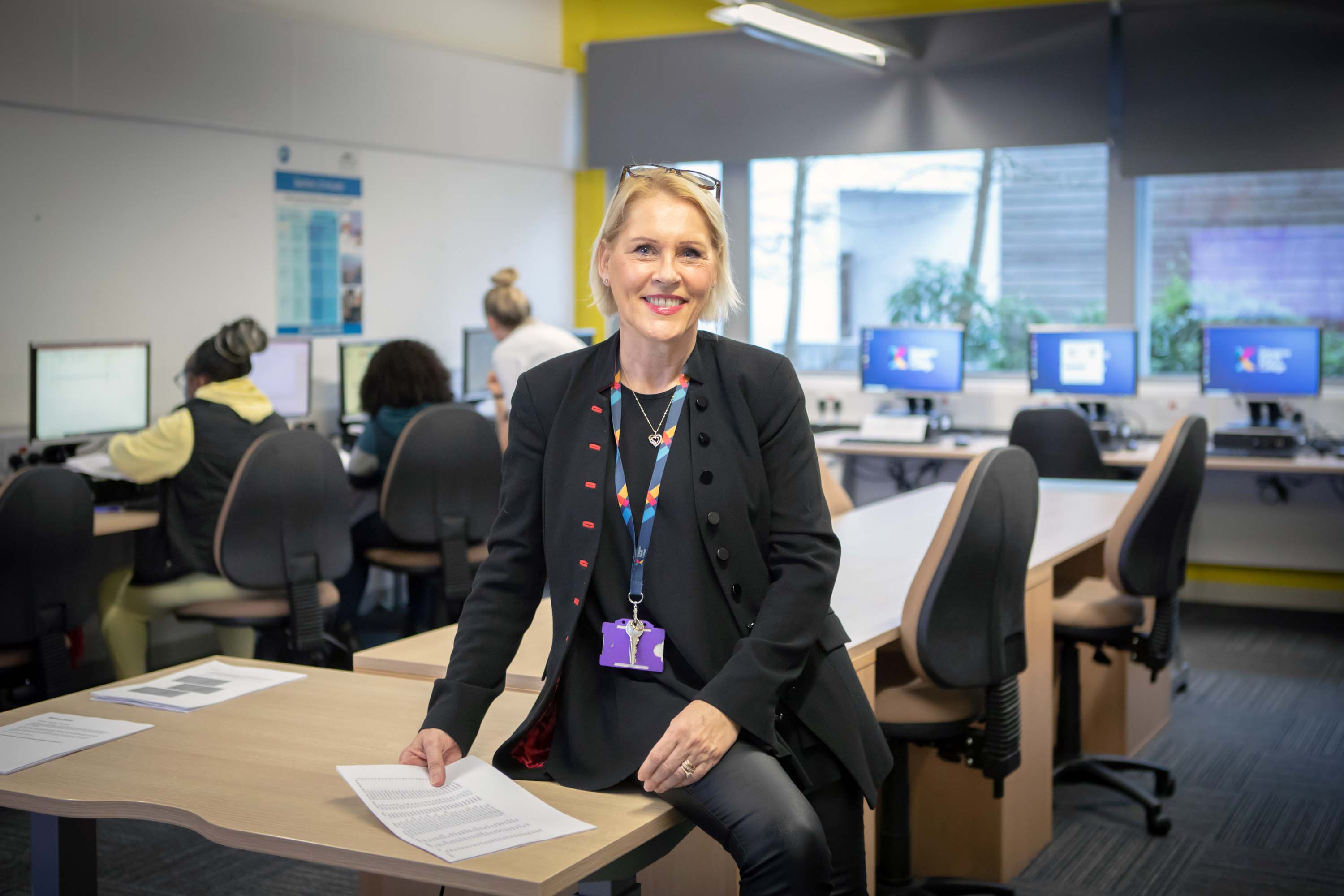 Business and Administration lecturer in a computer classroom at Glasgow Kelvin College.