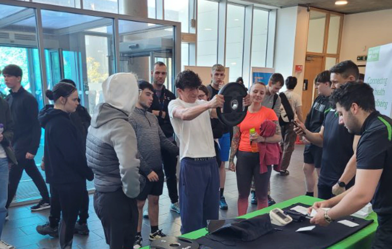Students at Glasgow Kelvin College gathered in the campus atrium, taking part in a weightlifting challenge and interactive stall for National Fitness Day. Students at Glasgow Kelvin College gathered in the campus atrium, taking part in a weightlifting challenge and interactive stall for National Fitness Day.
