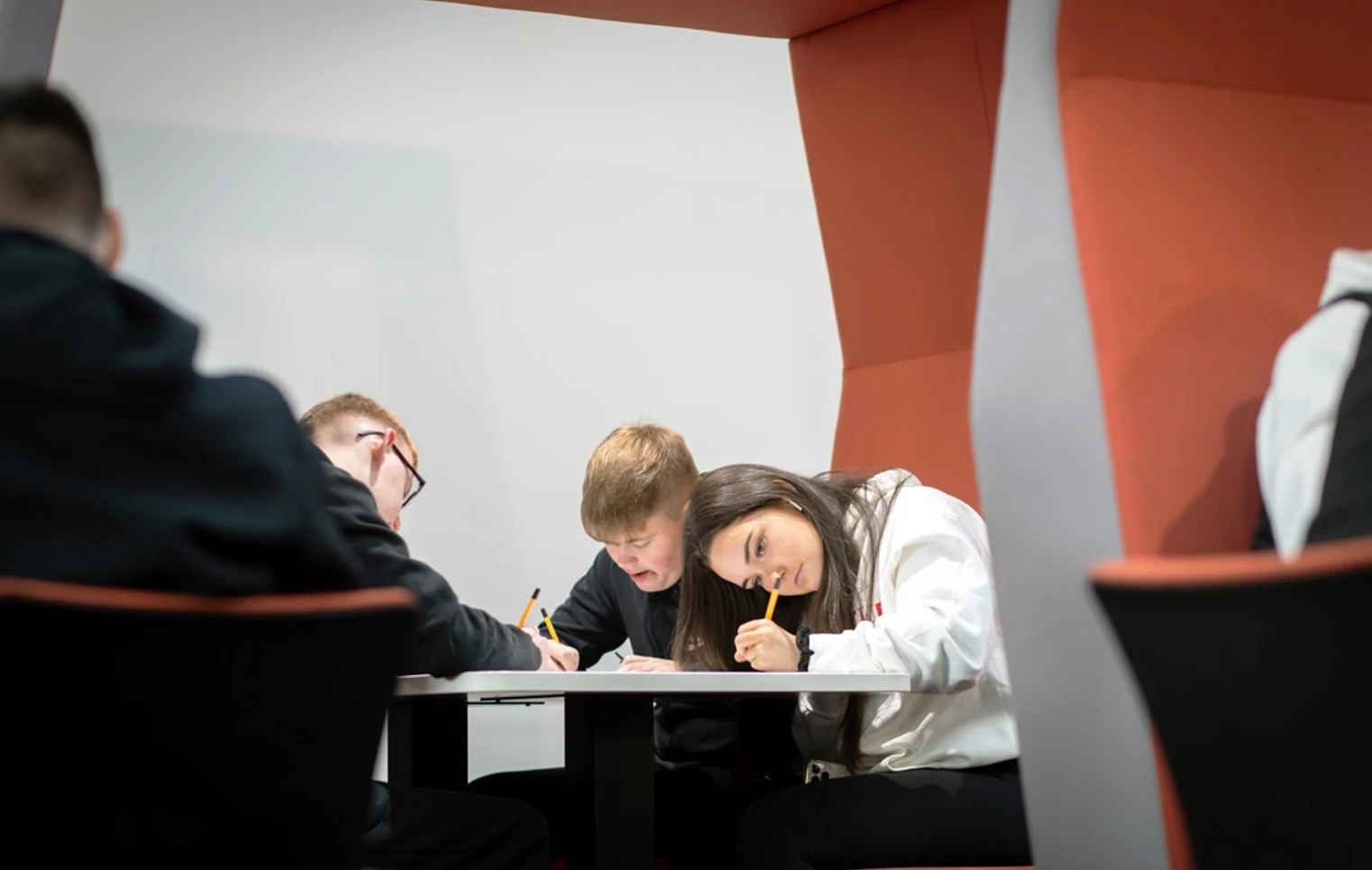 Students gathered in a pod seating area at Glasgow Kelvin College’s Springburn Campus, working collaboratively with laptops and study materials. Students gathered in a pod seating area at Glasgow Kelvin College’s Springburn Campus, working collaboratively with laptops and study materials.